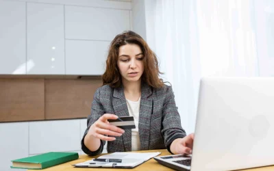 imgi_185_woman-is-relaxing-home-shopping-online-using-laptop-credit-card-1-scaled